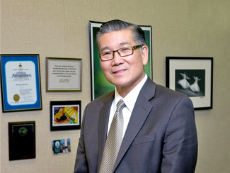This image shows Michael Matsuda, the superintendent of the Anaheim Union High School District.