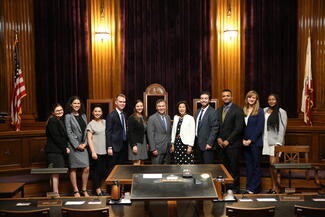 Chief Justice and Martin hoshino with fellows in the third district court of appeal courtroom