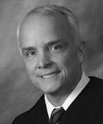 Justice Jim Humes