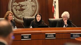 Chief Justice Patricia Guerrero leads the May 12 Judicial Council meeting. She is supported by the council's Acting Administrative Director Millicent Tidwell (left) and California Supreme Court Justice Carol Corrigan (right).
