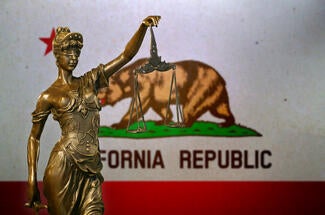 Lady Justice and California Flag