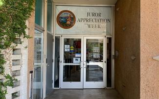banner reading "Juror Appreciation Week" hung over entrance to Kern Superior Court