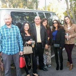 Court Staff in front of vehicle