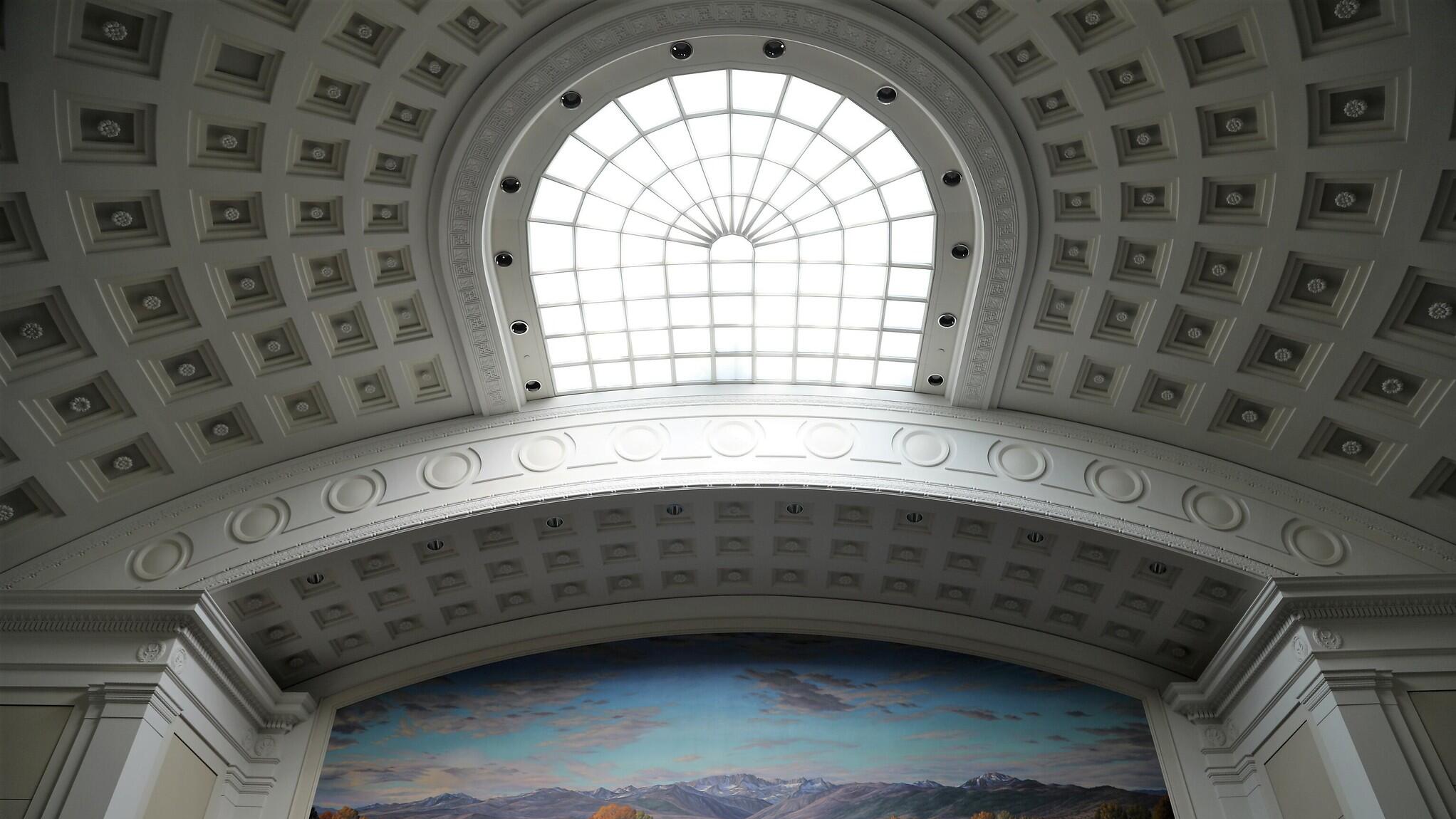 Supreme Court mural above bench