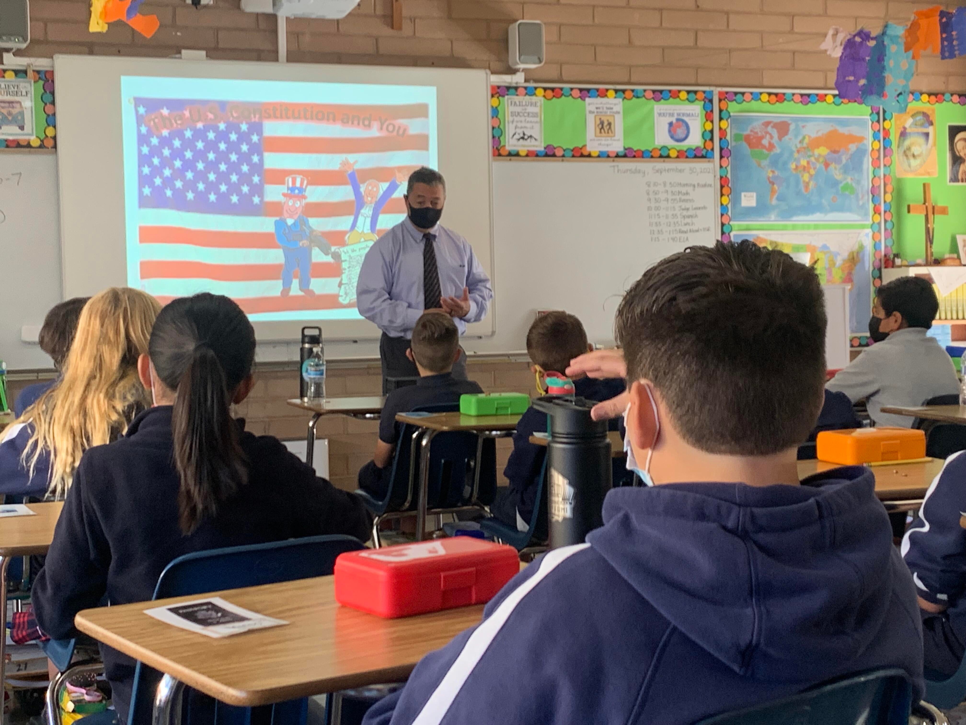 judge in front of classroom