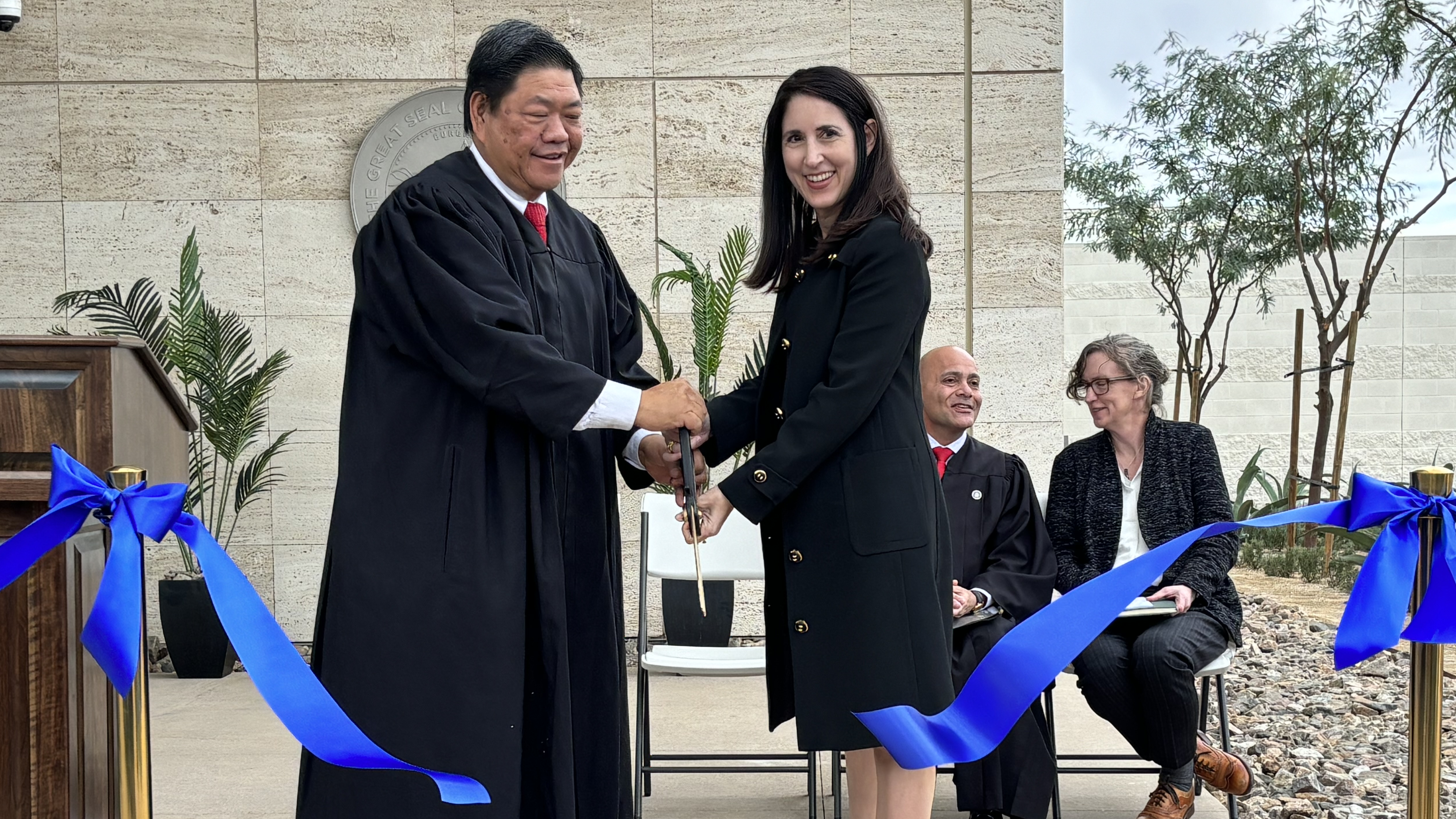 Chief Justice Patricia Guerrero cutting ribbon with Presiding Justice William D. Quan