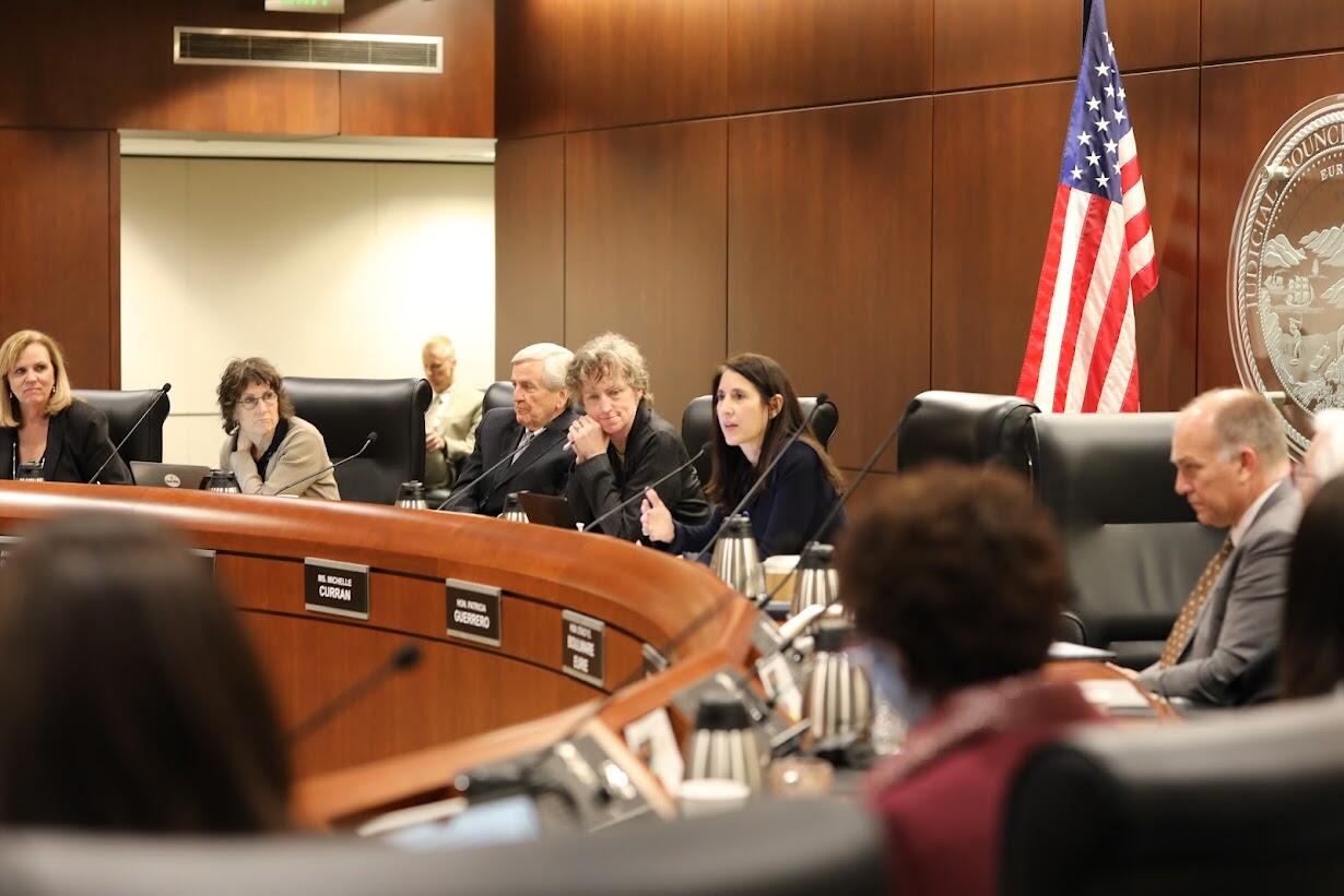 People sitting around a boardroom