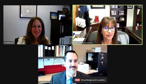 Three people taking part in a Zoom call