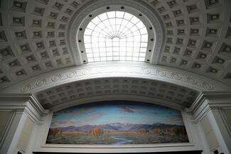 Supreme Court mural above bench