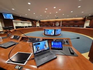 empty boardroom filled with tech