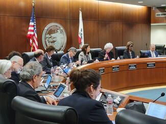 boardroom wide shot council seal