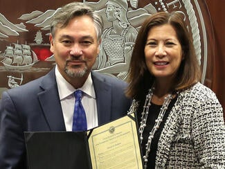 martin hoshino with chief justice cantil-sakauye holding award
