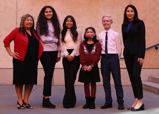 Justice Patricia Guerrero outside with elementary students 