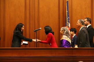 Chief Justice Guerrero shaking hands with Justice Mesiwala during COJA