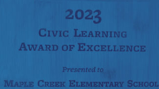 Civic Learning Award of Excellence engraved on bamboo