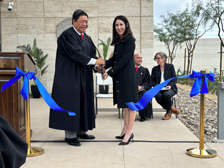 Chief Justice Patricia Guerrero cutting ribbon with Presiding Justice William D. Quan