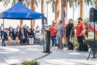 Assemblymember James Ramos and performers at San Bernardino court ceremony