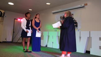 judge speaking to students