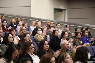 people sitting in an auditorium