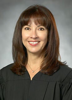 Judge Ana España