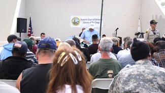 Dozens of homeless veterans register for Homeless Court, a special court session offered by the San Diego Superior Court. The goal of homeless court is to help homeless people resolve minor misdemeanors and infractions.
