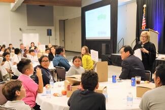 Justice Judith McConnell invites students to take the role of judge during a program to teach kids about the judicial branch at the California Lawyers Association annual conference.